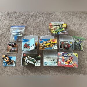 Lego multiple sets with instructions and organizer boxes
